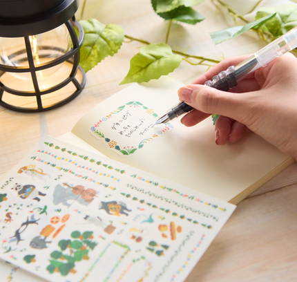 writing with preppy fountain pen on the Midori - Yurulog Water-based Pen Sticker Sheets