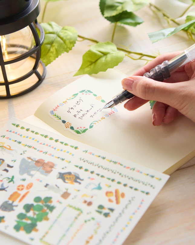 writing with preppy fountain pen on the Midori - Yurulog Water-based Pen Sticker Sheets